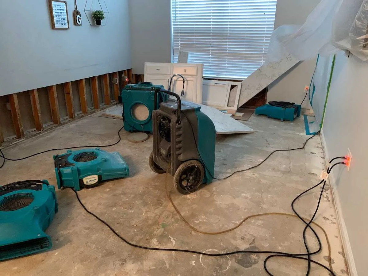 Dehumidifier in flood-cut room for Water Damage Restoration in Chesterland